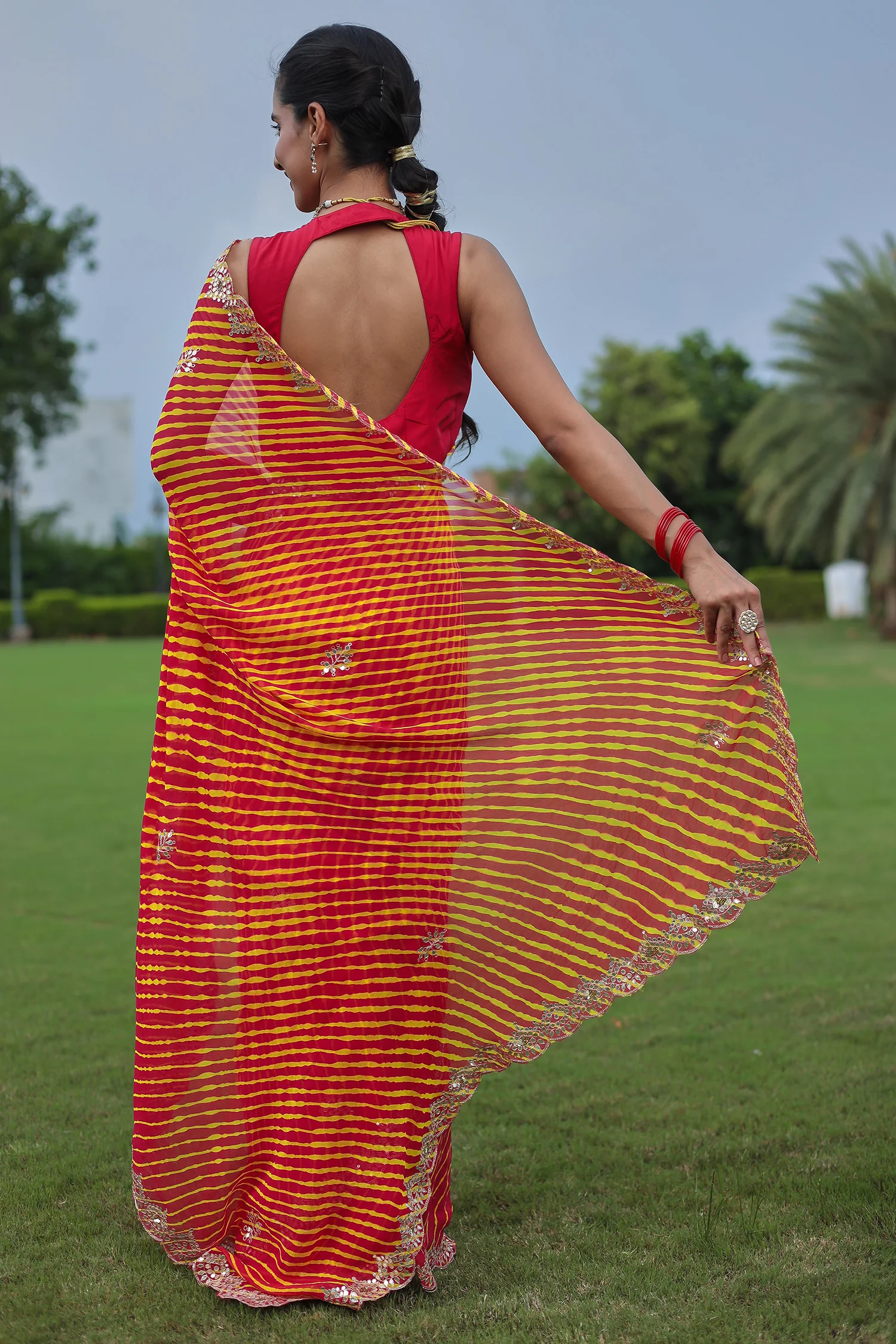 Leheriya Georgette Saree with Aari and Gota Patti work - Image 13